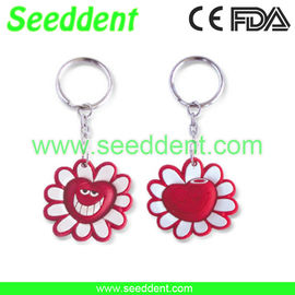 China Flower shape key chain with teeth or without teeth supplier