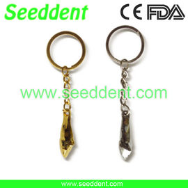 China Fang metal tooth key chain golden / silver supplier