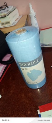 Disposable Dental Bib Roll 80pcs/ Roll Dental Apron with Tie Strings Waterproof Poly Patient Aprons for Dental Clinic supplier